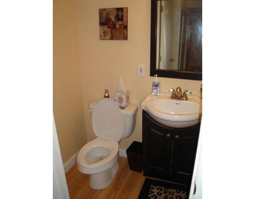 47 Stone Road Arlington, MA 02474 - Photo 8 of 10 a bathroom with a sink and a toilet