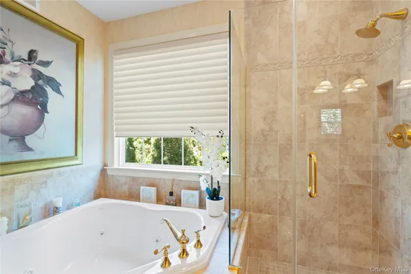 a white bath tub sitting next to a window