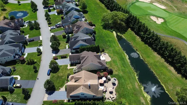 an aerial view of a house with a garden