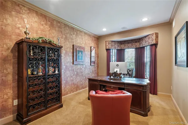 a dining room with furniture and window