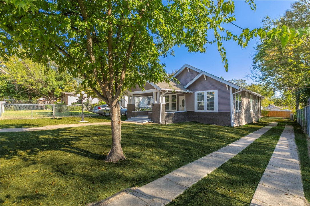 1007 North 22nd Street Waco, TX 76707 - Photo 22 of 26 a front view of a house with a yard