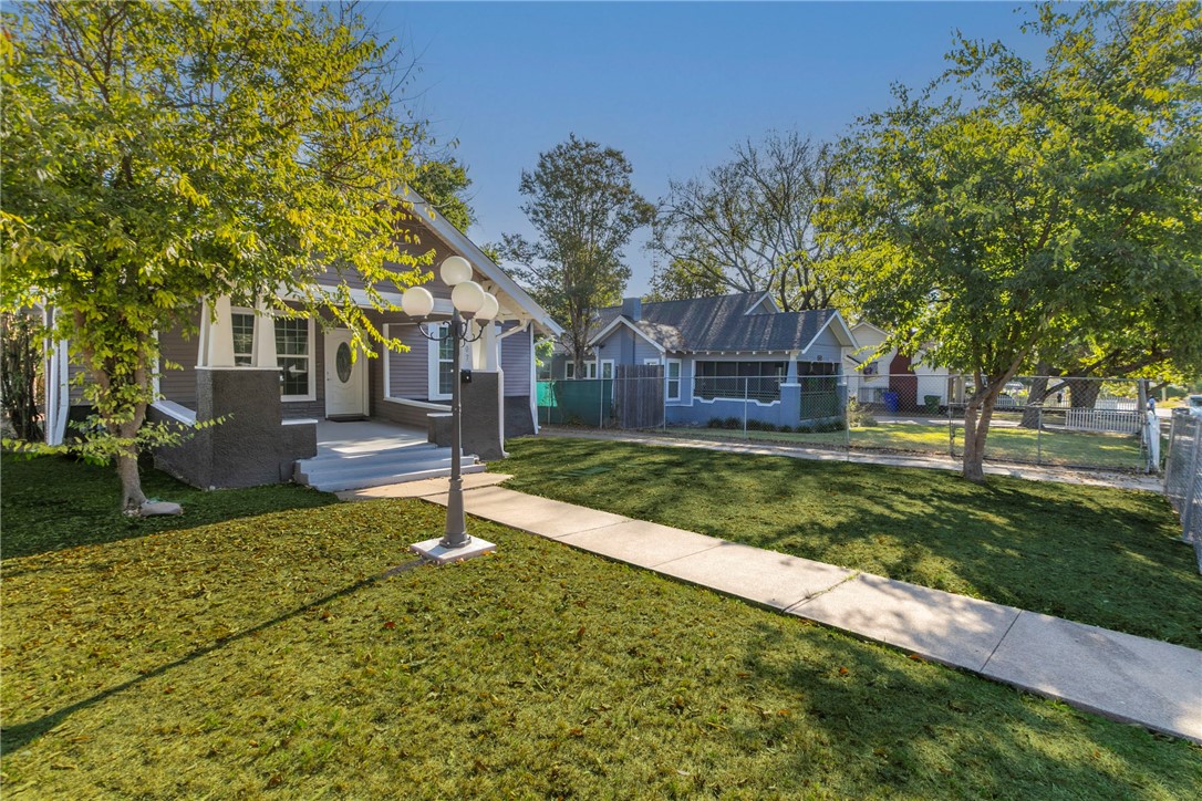 1007 North 22nd Street Waco, TX 76707 - Photo 23 of 26 a house with huge green field in front of it