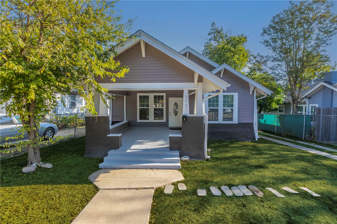 1007 North 22nd Street Waco, TX 76707 - Photo 25 of 26 a front view of house with yard and green space