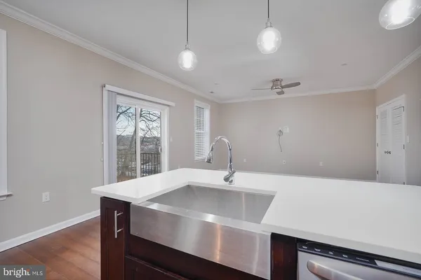 a bathroom with a sink and a window