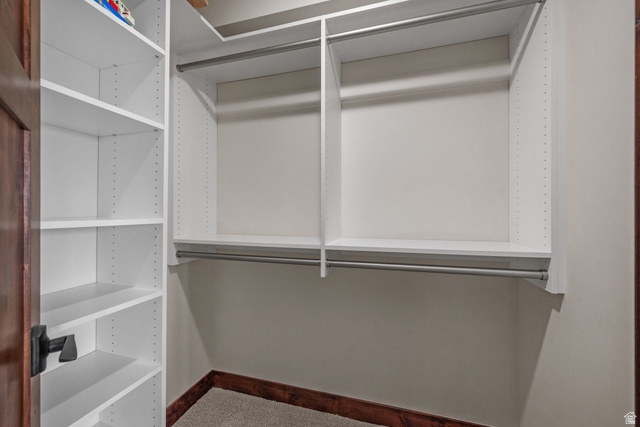 4221 Juniper Circle Alpine, UT 84004 - Photo 32 of 66 Custom closet system featuring white shelving and hanging rods