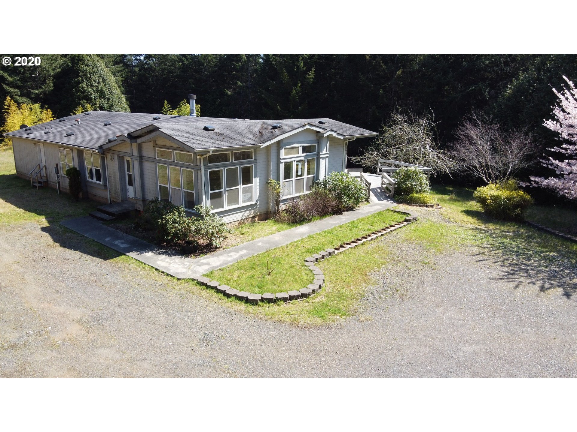 a upper view of a house with a swimming pool