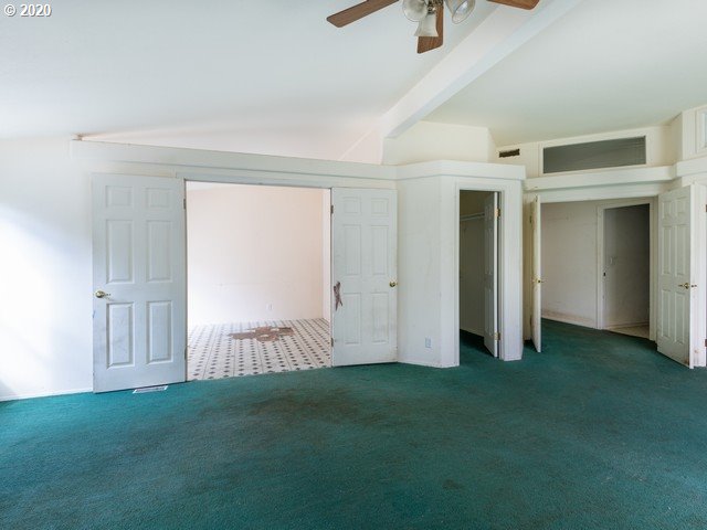 65477 Elk Ridge Road North Bend, OR 97459 - Photo 25 of 32 a view of empty room with floor to ceiling window