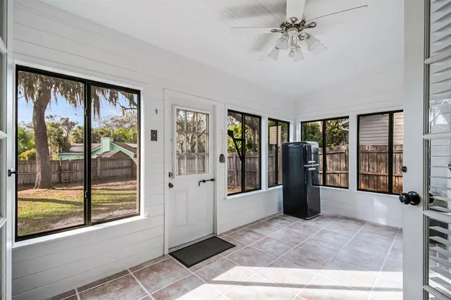 a view of a hallway with windows