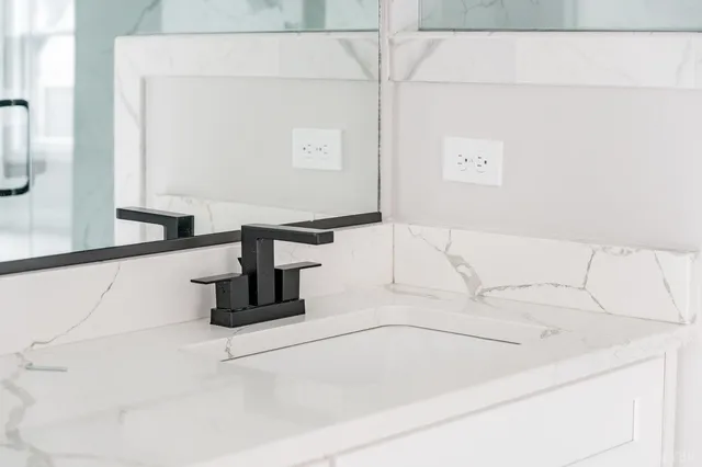 an aerial view of a house with a ocean view