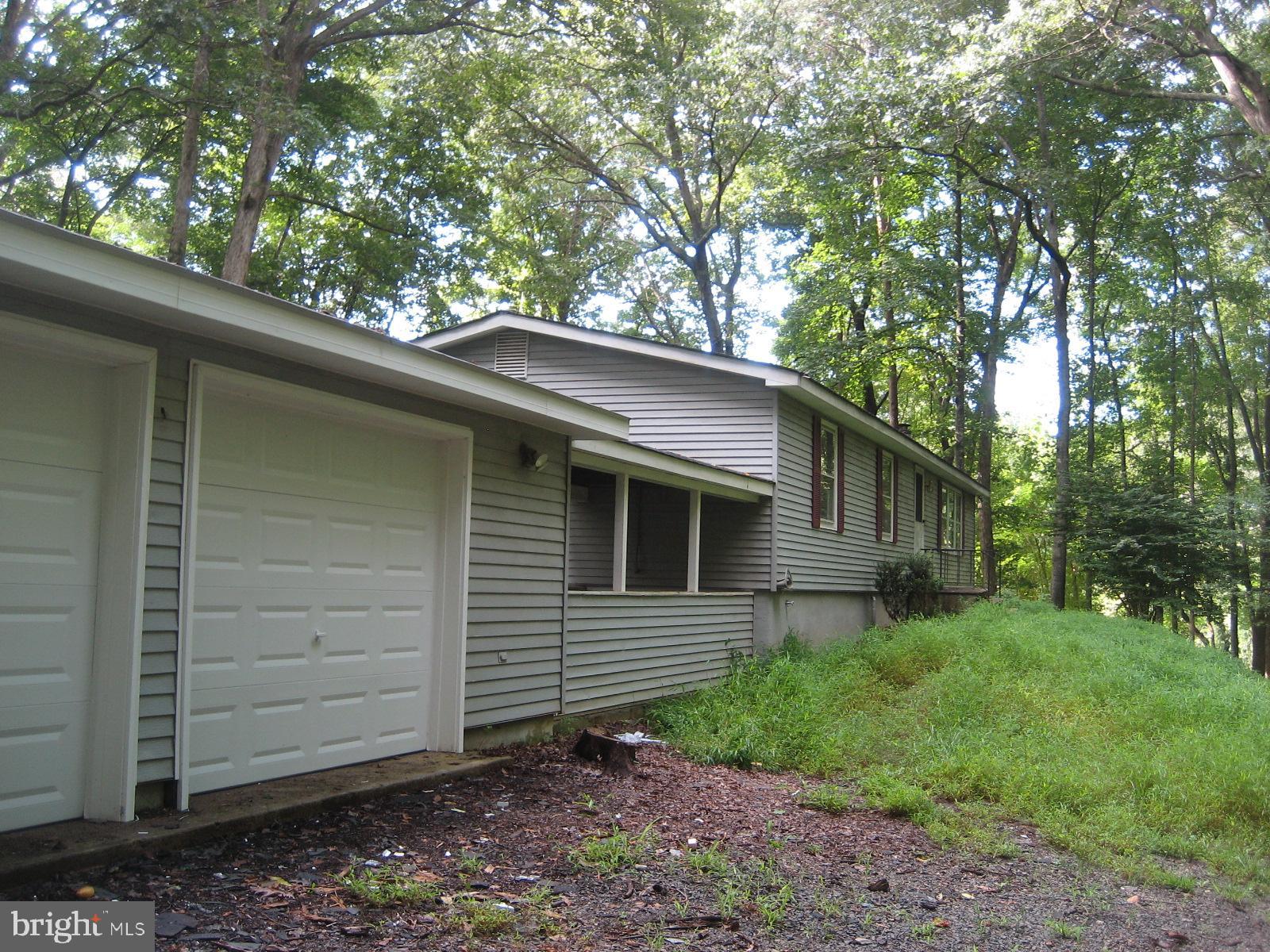 House and 3 car garage with breezeway