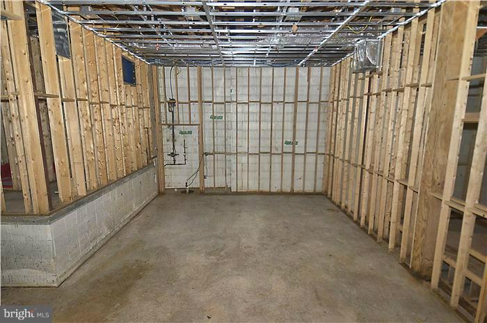 17206 Dr Bird Road Silver Spring, MD 20906 - Photo 7 of 16 Basement basketball ct