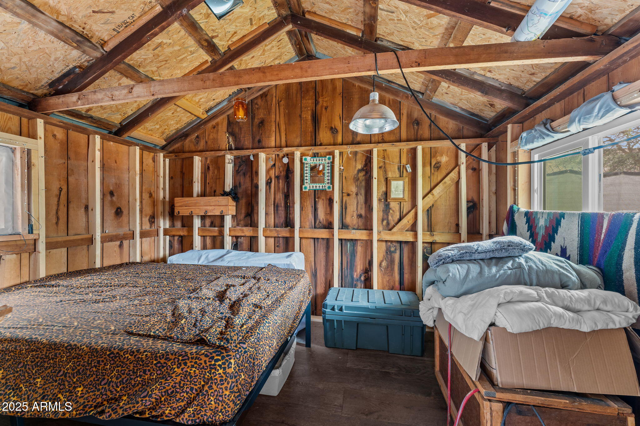 16610 Walnut Lane Yarnell, AZ 85362 - Photo 14 of 18 a bed room with a bed and a chair