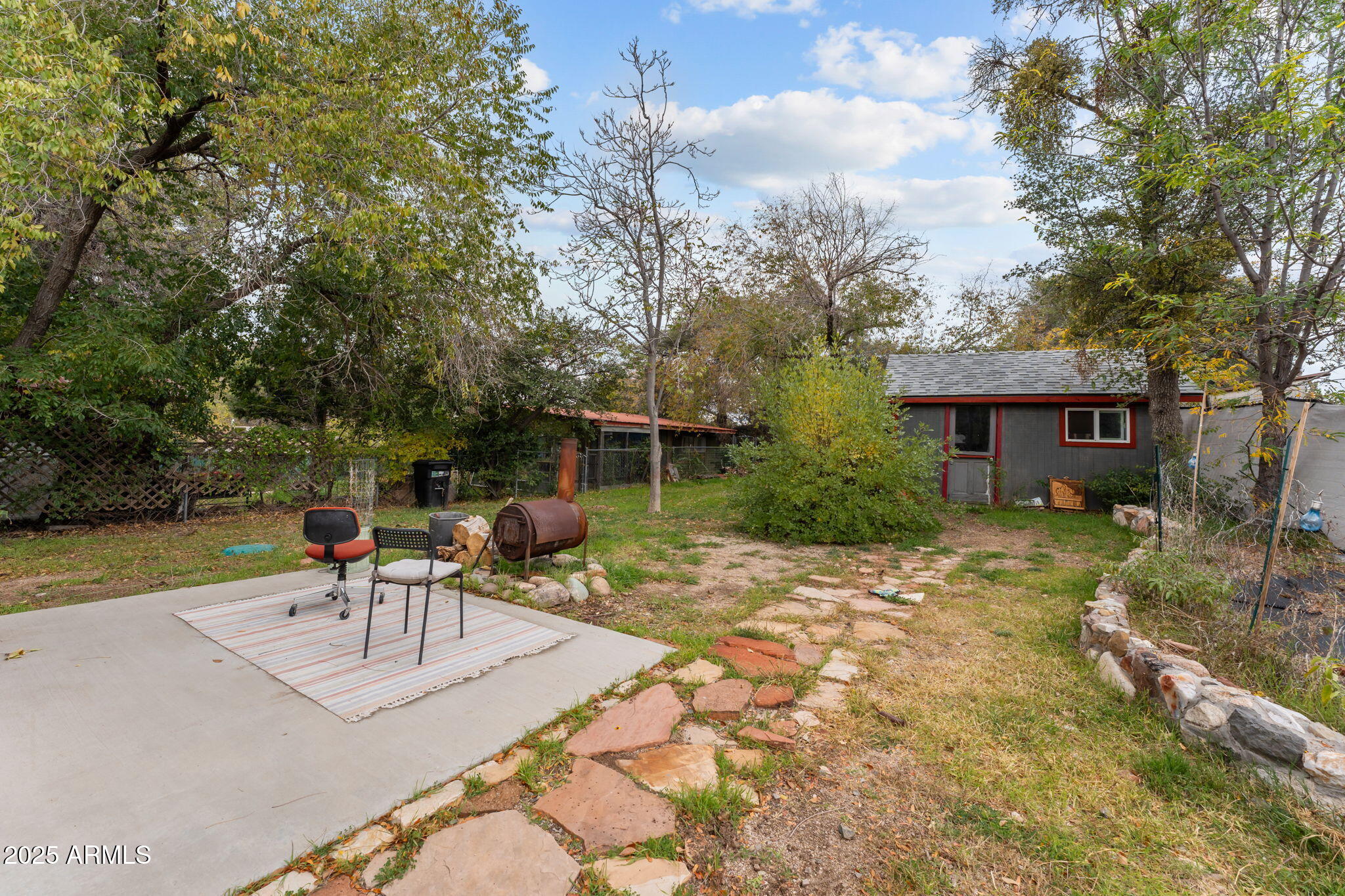 16610 Walnut Lane Yarnell, AZ 85362 - Photo 15 of 18 a lawn chairs sitting in the backyard of a house
