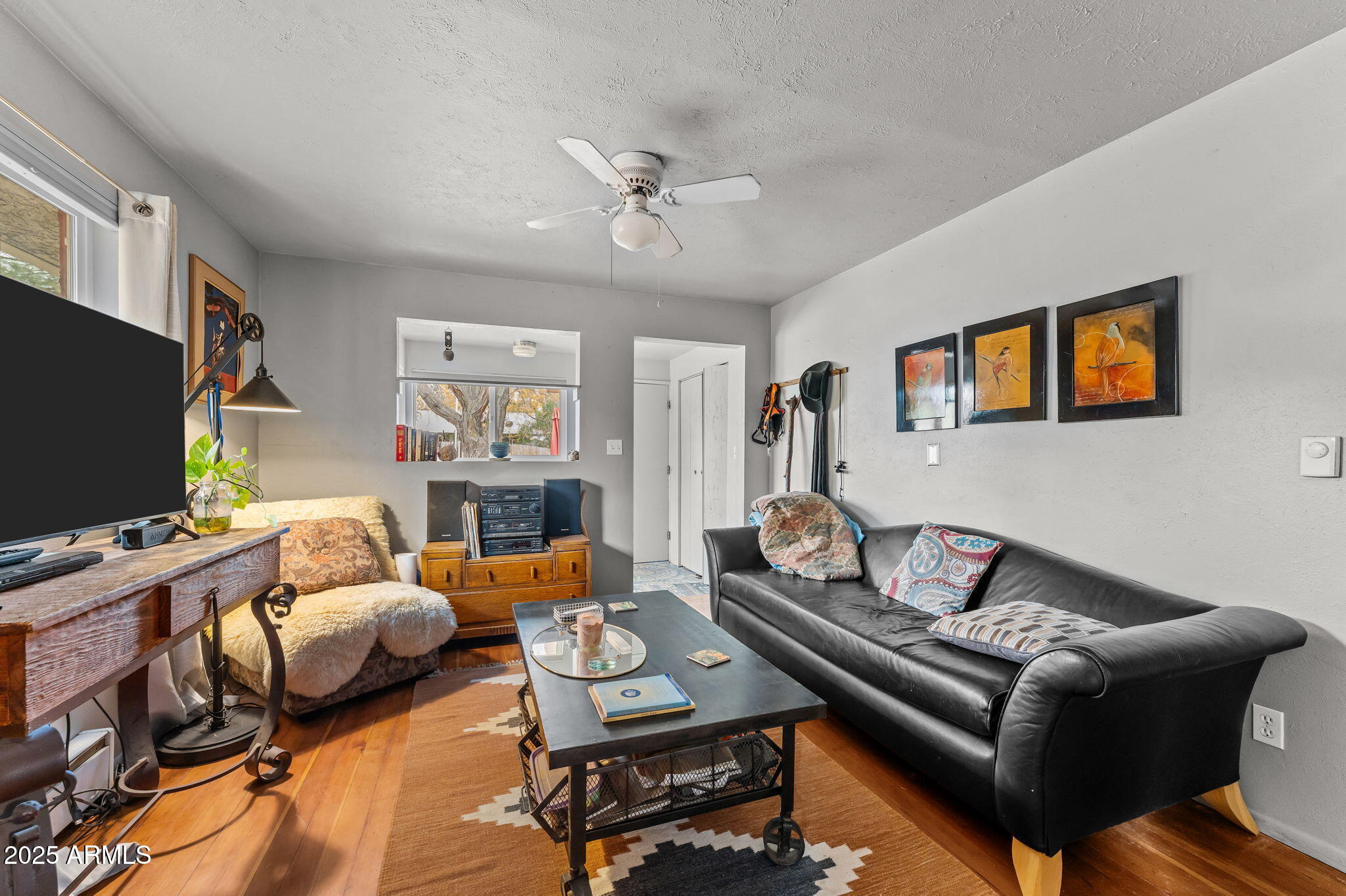 16610 Walnut Lane Yarnell, AZ 85362 - Photo 2 of 18 a living room with furniture and a flat screen tv