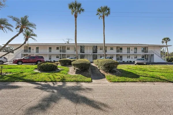 a aerial view of a house with a garden and plants