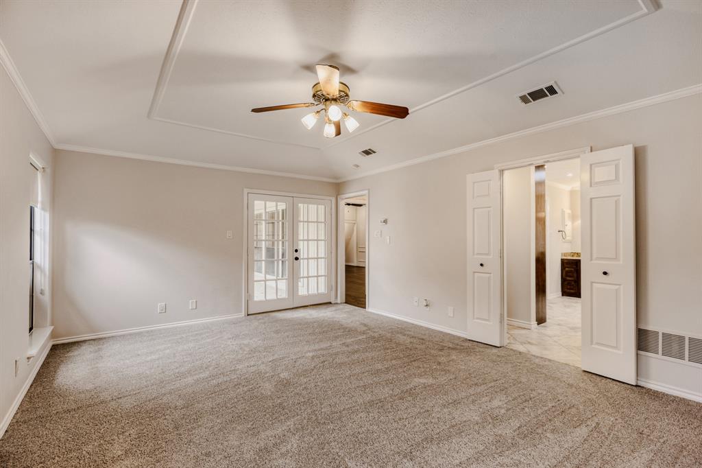 6108 Bluff Point Drive Dallas, TX 75248 - Photo 11 of 28 a view of an empty room with a window
