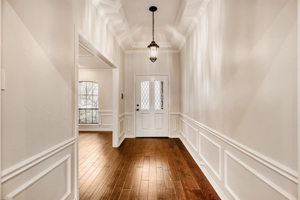 6108 Bluff Point Drive Dallas, TX 75248 - Photo 4 of 28 a view of an entryway with wooden floor