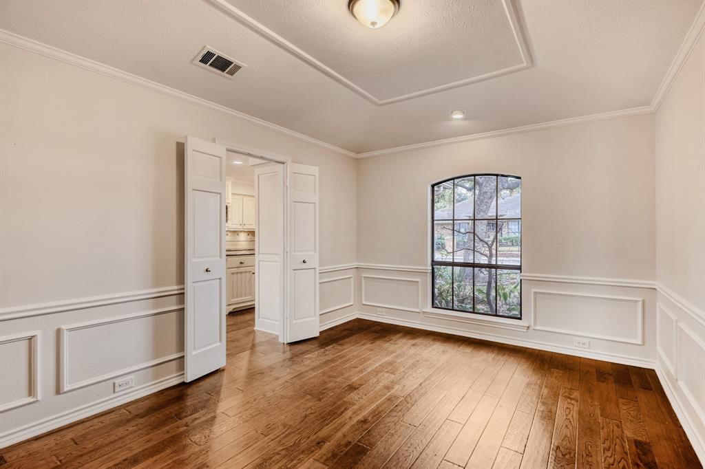 6108 Bluff Point Drive Dallas, TX 75248 - Photo 5 of 28 wooden floor in an empty room with a window