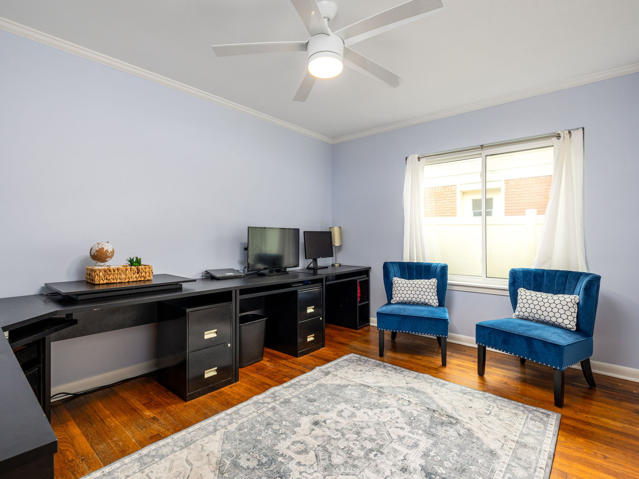 4710 Frontier Trail Austin, TX 78745 - Photo 20 of 32 a living room with furniture and a flat screen tv