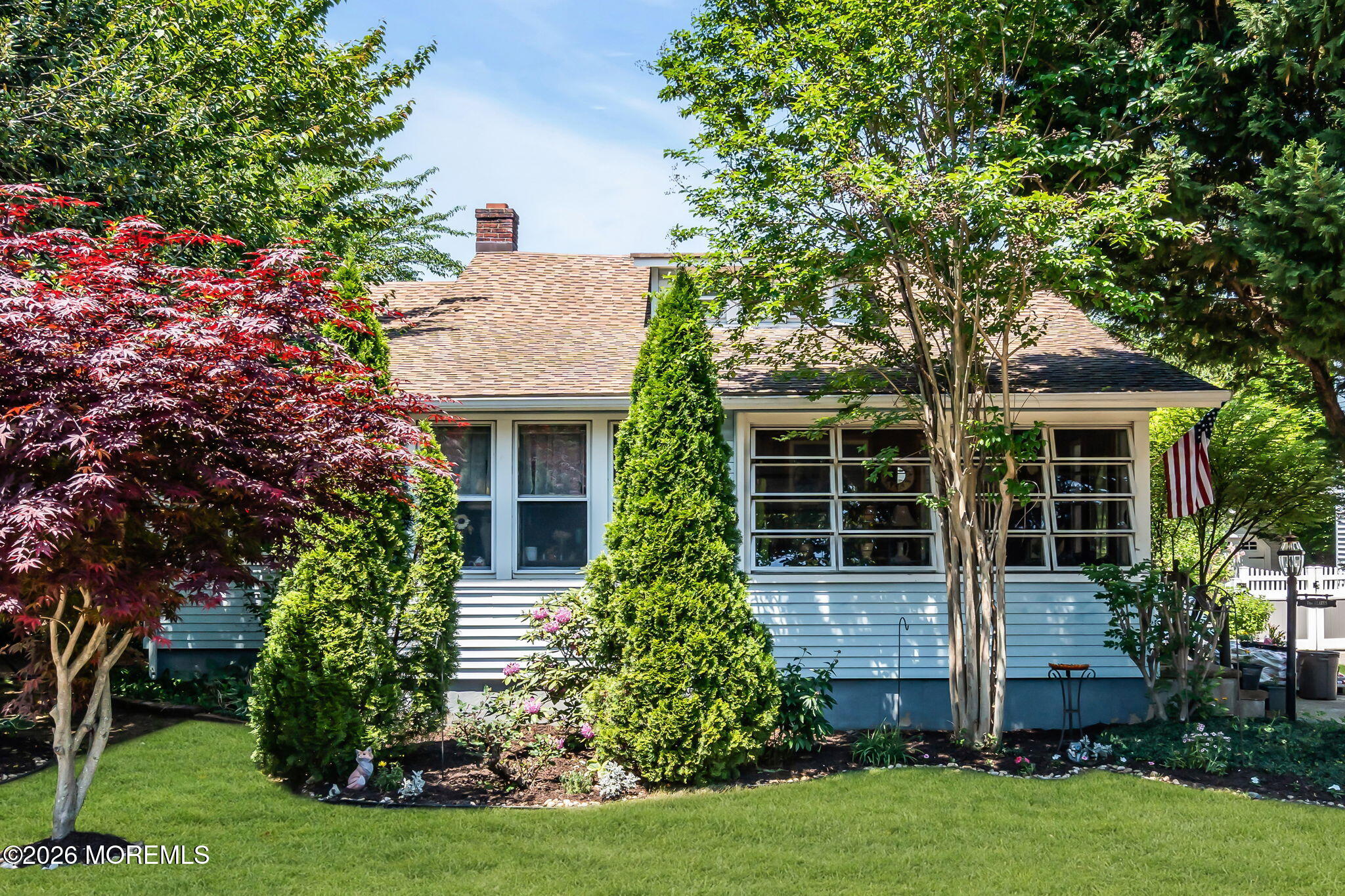 24 Foster Street Middletown, NJ 07701 - Photo 1 of 23 a front view of a house with garden