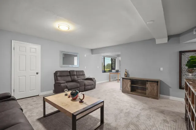 a living room with furniture and a couch