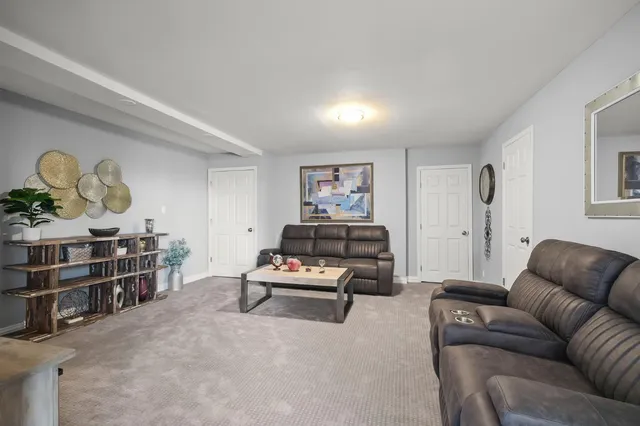 a living room with furniture and a couch