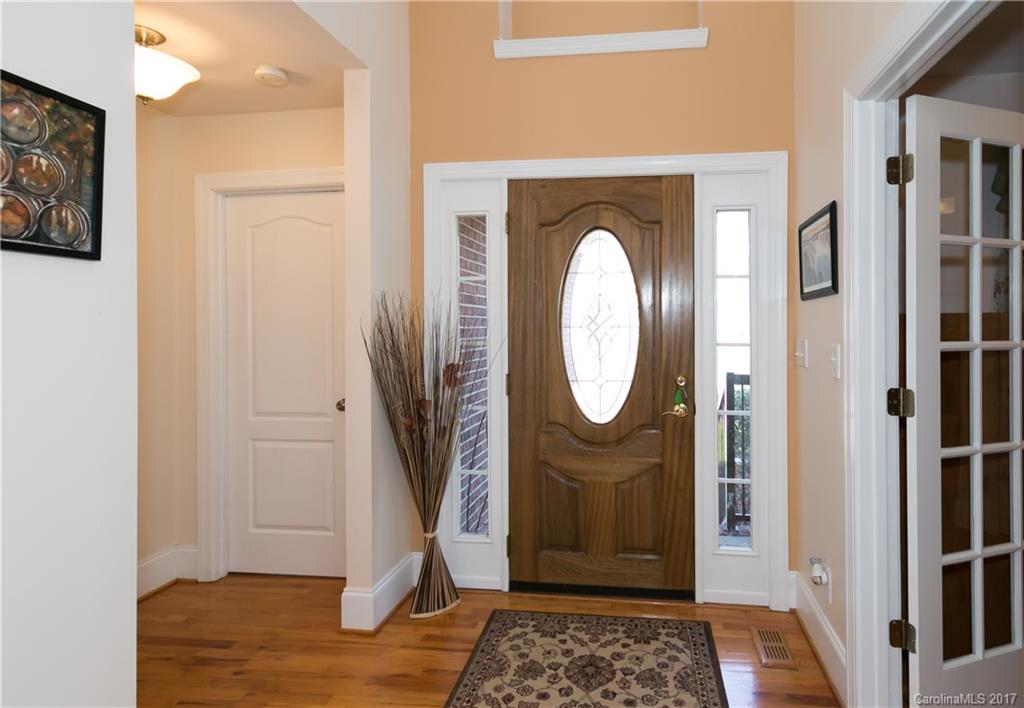 223 Beaten Path Road Mooresville, NC 28117 - Photo 2 of 24 a view of a entryway door with wooden floor