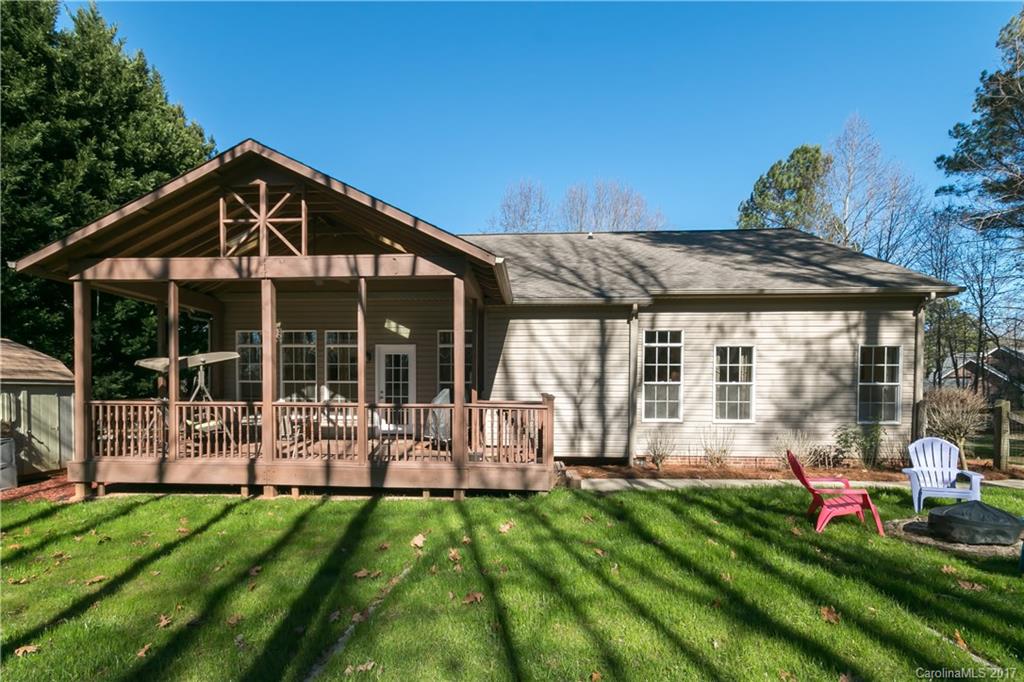 223 Beaten Path Road Mooresville, NC 28117 - Photo 19 of 24 a view of a house with backyard porch and sitting area