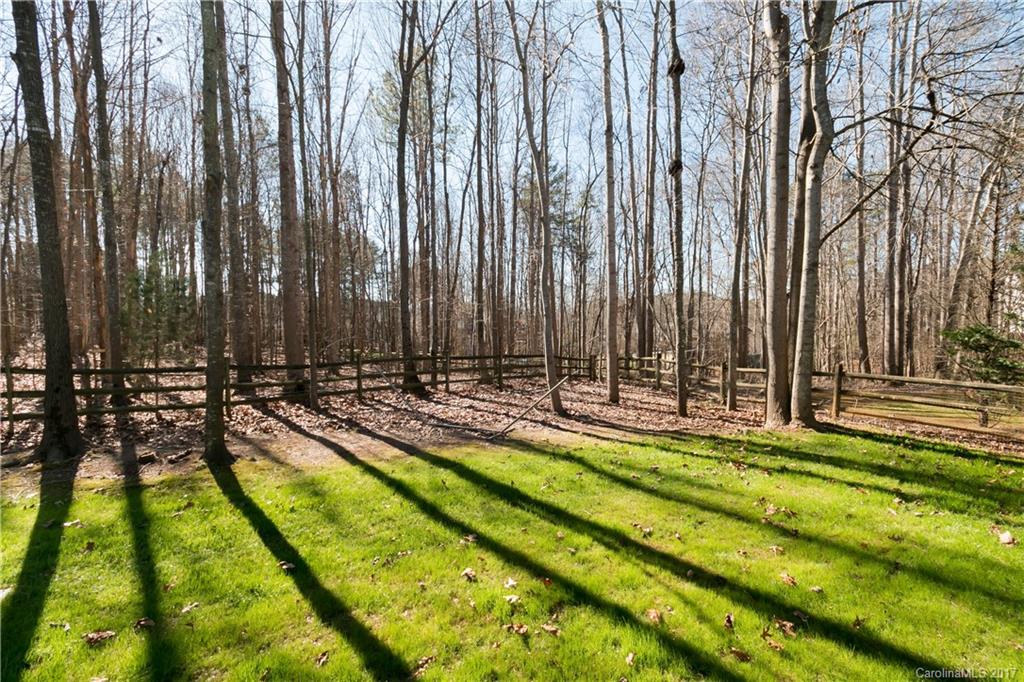 223 Beaten Path Road Mooresville, NC 28117 - Photo 20 of 24 a view of swimming pool with a garden