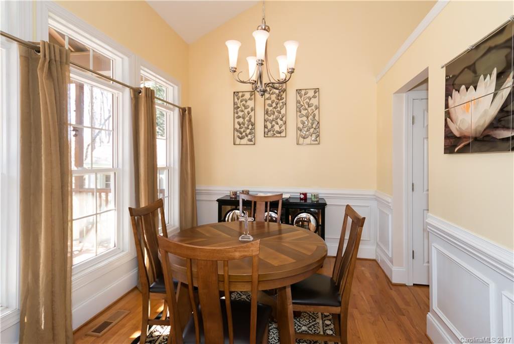 223 Beaten Path Road Mooresville, NC 28117 - Photo 3 of 24 a view of a dining room with furniture window and wooden floor