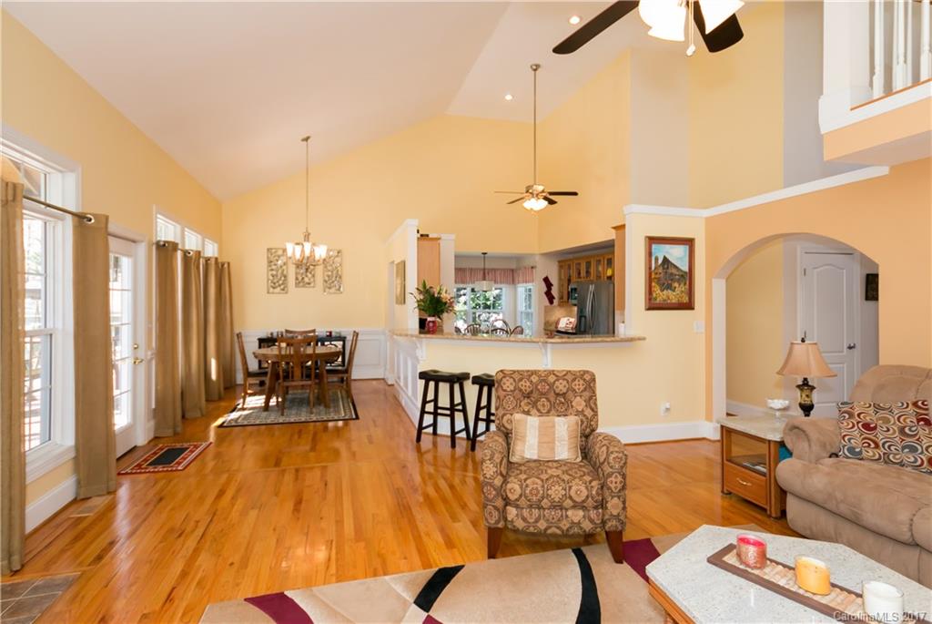 223 Beaten Path Road Mooresville, NC 28117 - Photo 5 of 24 a living room with furniture and wooden floor