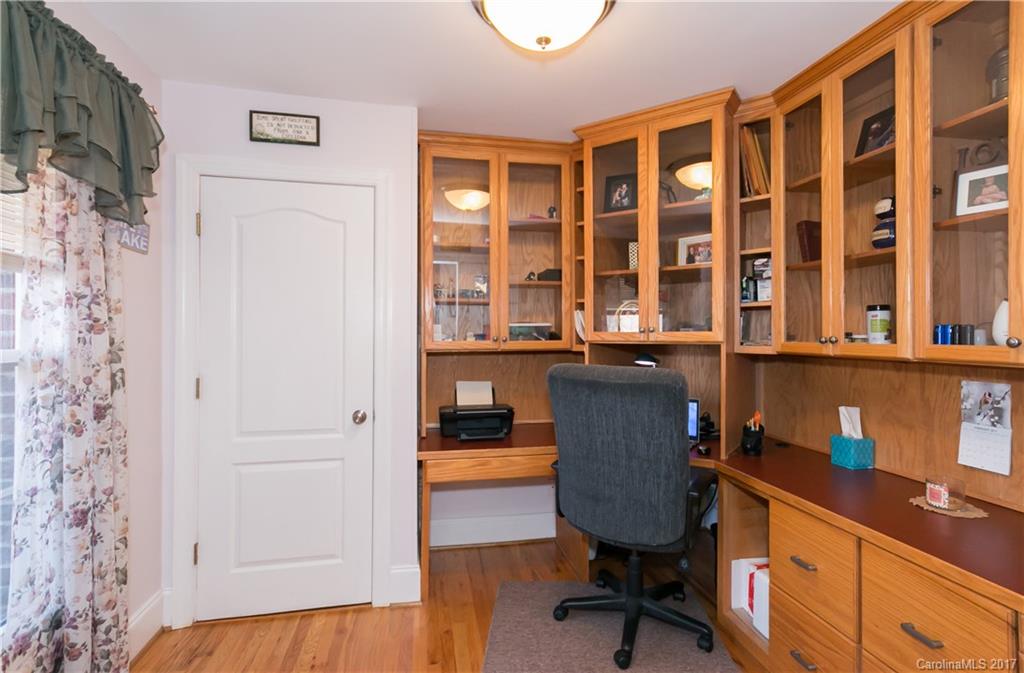 223 Beaten Path Road Mooresville, NC 28117 - Photo 10 of 24 a view of a workspace with furniture and a window