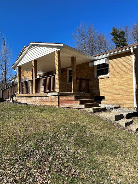 15 Kyle Road Mercer, PA 16137 - Photo 1 of 11 a front view of a house with garage