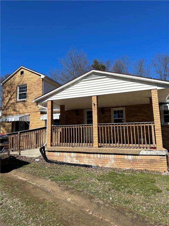 15 Kyle Road Mercer, PA 16137 - Photo 2 of 11 a front view of a house with a porch