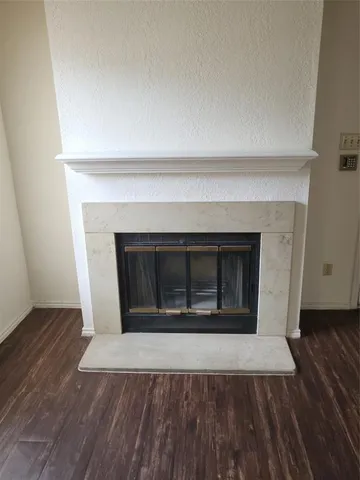 a living room with a fireplace