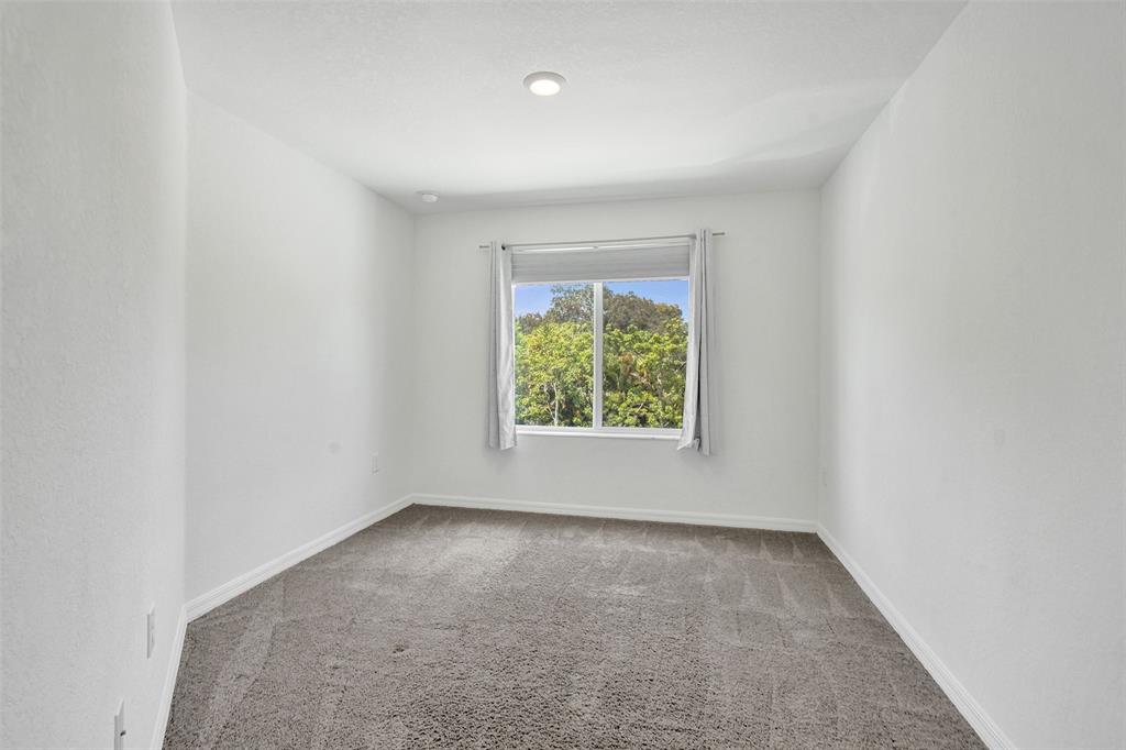 4748 Southwest 63rd Terrace, Unit 4748 Davie, FL 33314 - Photo 20 of 31 an empty room with a window