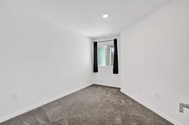 a bathroom view of a toilet and a sink