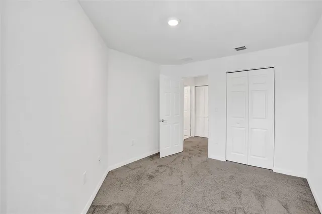 a house with a tree in front of it