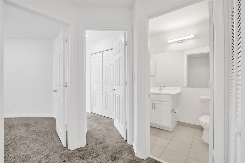 4748 Southwest 63rd Terrace, Unit 4748 Davie, FL 33314 - Photo 24 of 31 a bathroom view of a toilet and a sink