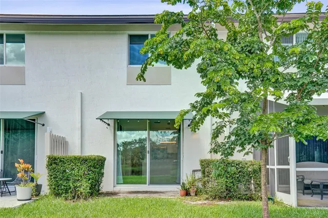 a view of a back yard of the house