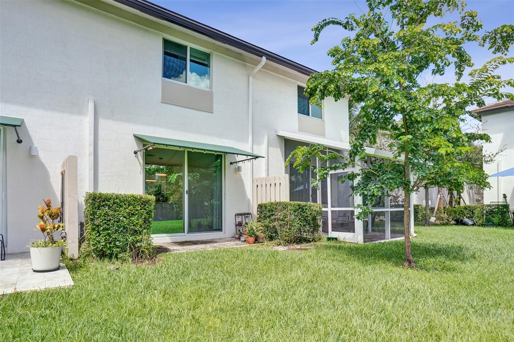 4748 Southwest 63rd Terrace, Unit 4748 Davie, FL 33314 - Photo 29 of 31 front view of a house with a yard