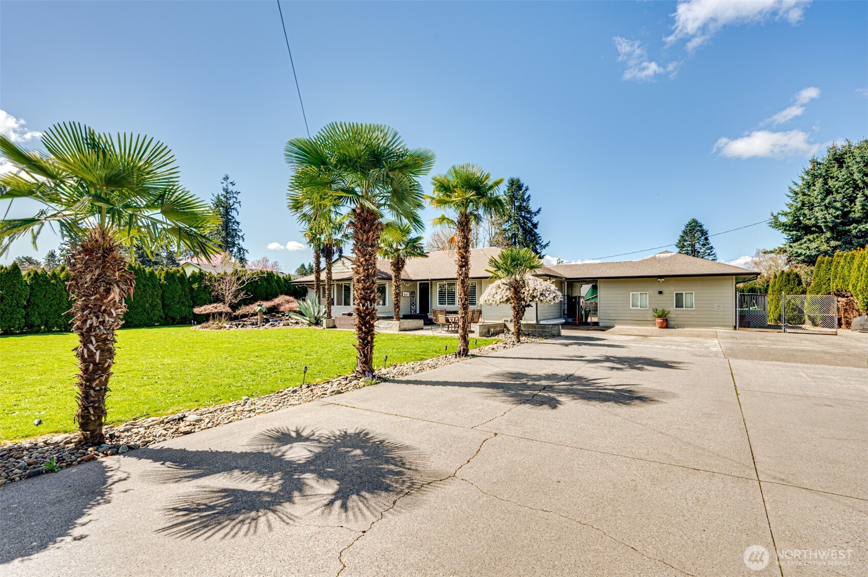 2126 Lewis River Road Woodland, WA 98674 - Photo 2 of 23 a view of house with outdoor space and swimming pool