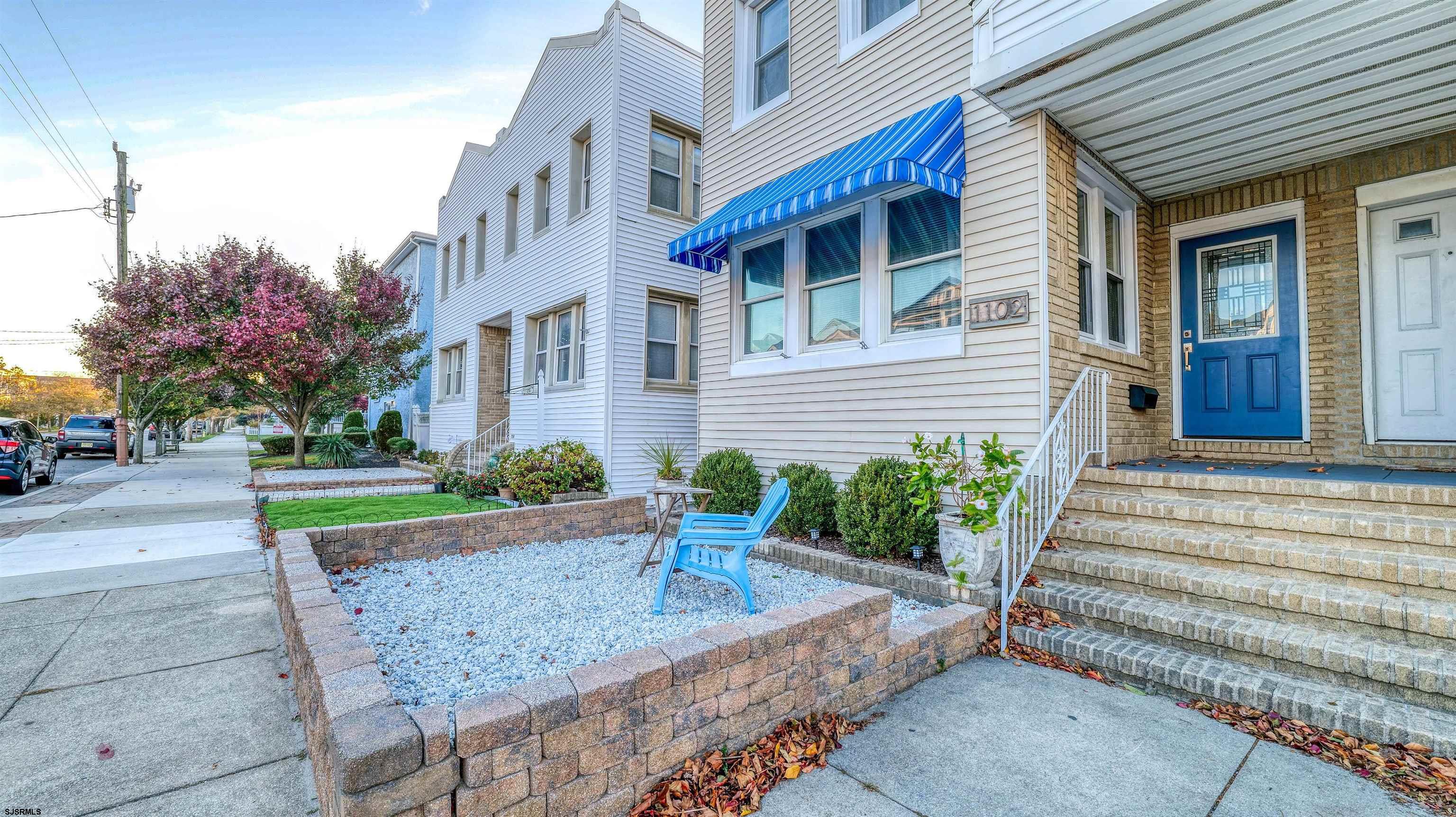 1102 Wesley Avenue, Unit 1 Ocean City, NJ 08226 - Photo 2 of 19 a view of a house with a small yard and plants