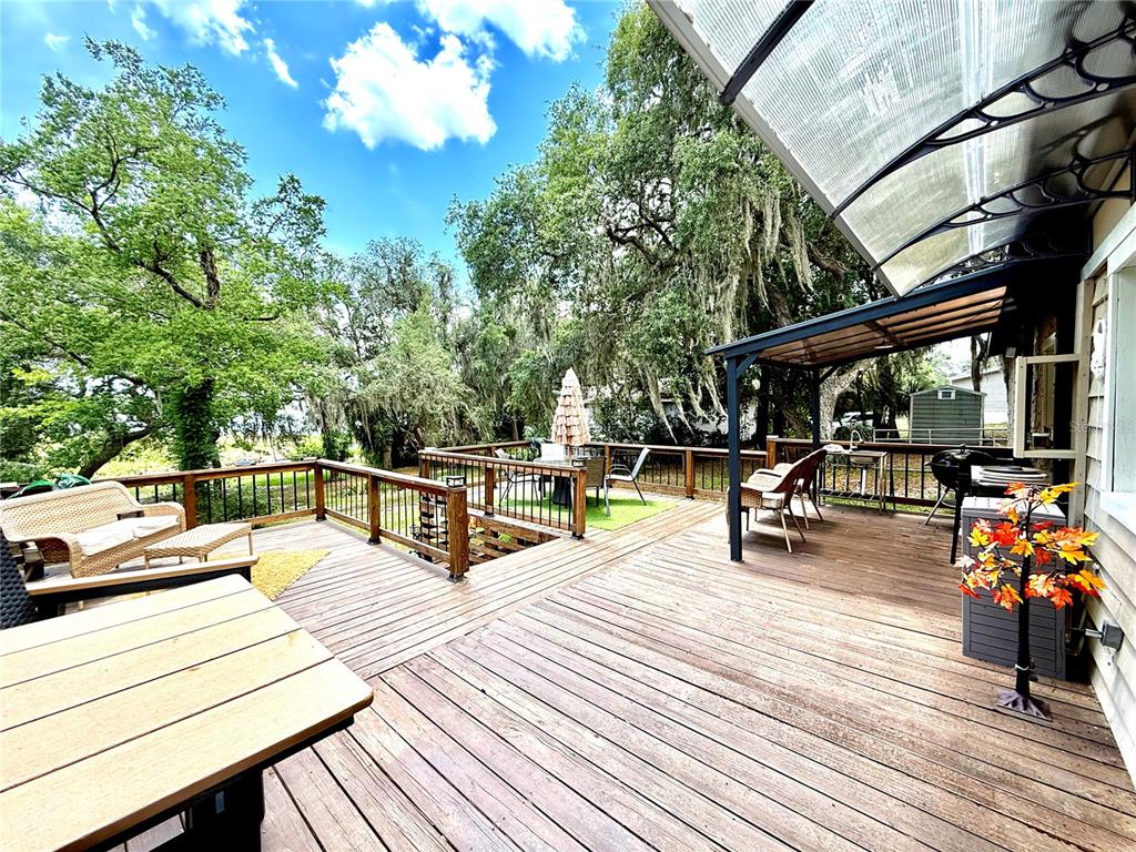 208 Ashley Street Hawthorne, FL 32640 - Photo 20 of 32 a view of a swimming pool with a patio