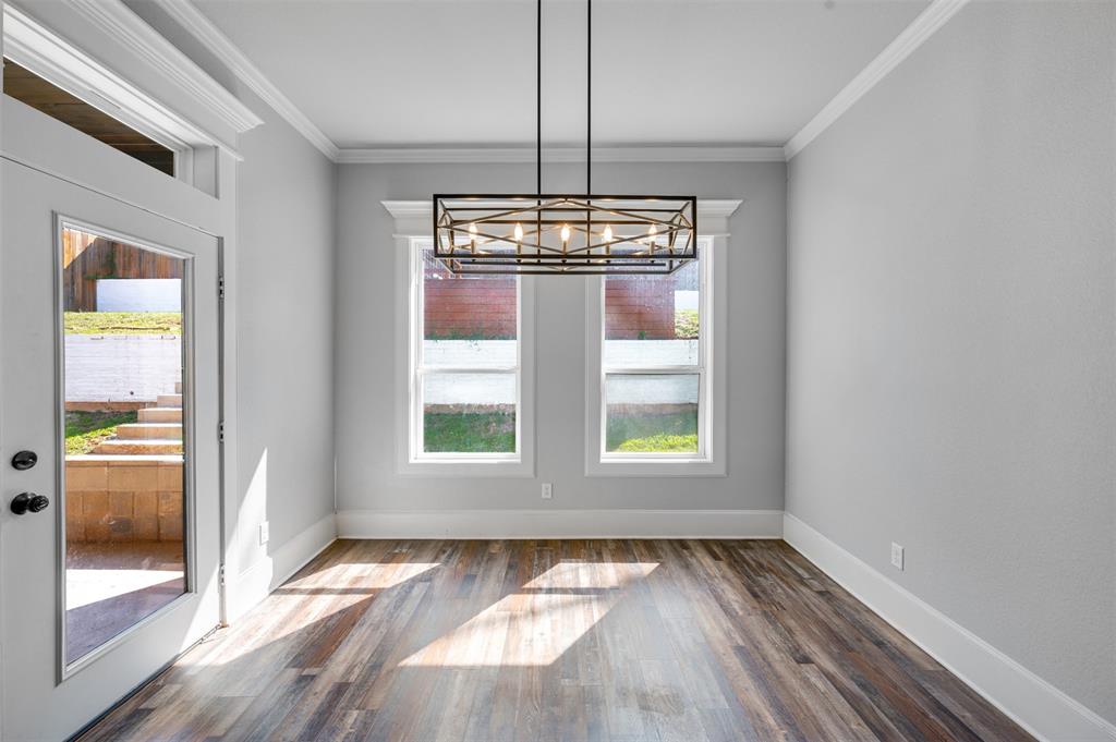 2830 Juniper Lane Tyler, TX 75701 - Photo 15 of 34 a view of an empty room with wooden floor and a window