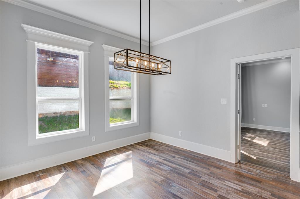 2830 Juniper Lane Tyler, TX 75701 - Photo 16 of 34 a view of empty room with wooden floor and fan