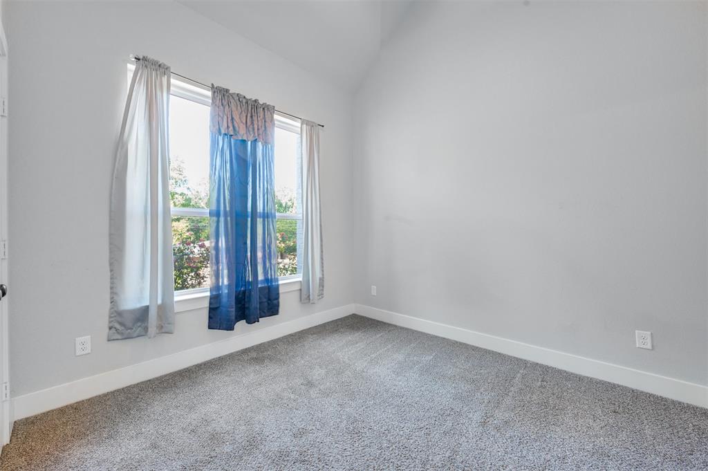 2830 Juniper Lane Tyler, TX 75701 - Photo 23 of 34 an empty room with windows