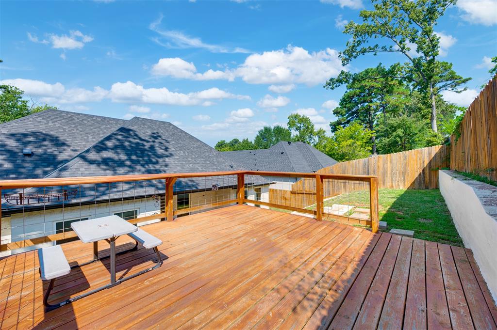 2830 Juniper Lane Tyler, TX 75701 - Photo 31 of 34 a balcony with wooden floor and outdoor seating