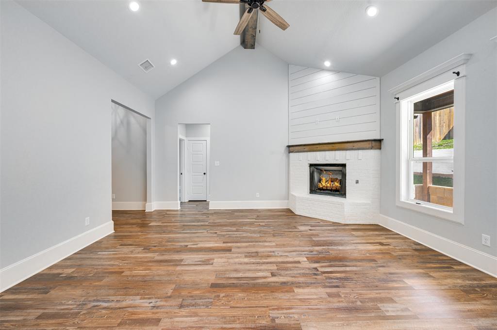 2830 Juniper Lane Tyler, TX 75701 - Photo 9 of 34 a view of empty room with a fireplace