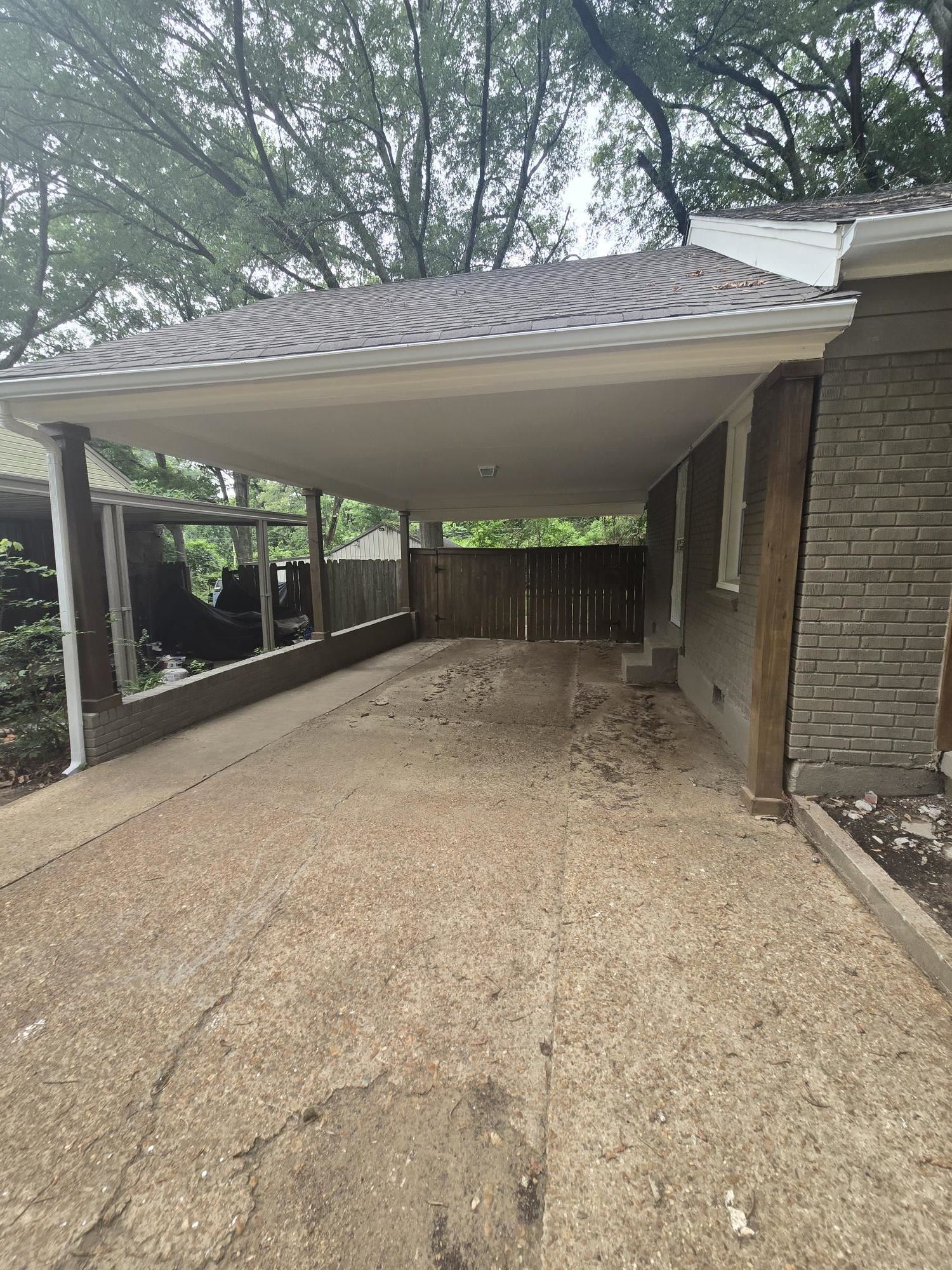 3551 Millington Road Memphis, TN 38127 - Photo 11 of 12 View of parking / parking lot featuring driveway and a carport